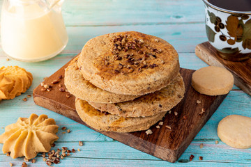  Cookies of different flavors and coffee cup