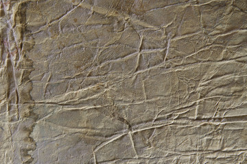 background of very old damaged crumpled paper. treasure map