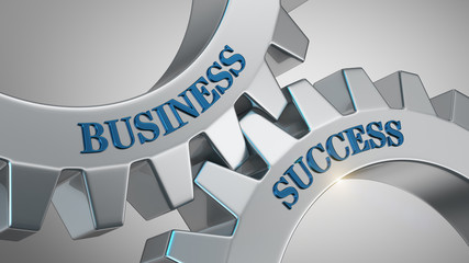 Business success concept. Words business success written on gear wheels.