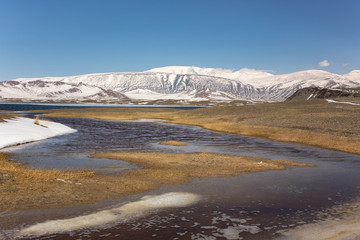 mongolian valley steppe river and mountains