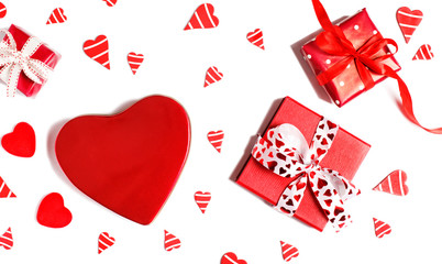 Red gift boxes and red hearts isolated on white background. Valentines day concept