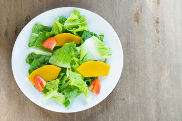 Mix salad vegetable  in white dish,vegan copy space