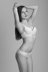 Naklejka premium Sexy woman in white lingerie gorgeous figure.