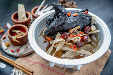 Chinese traditional nourishing health stew, stewed black bone chicken, Chinese black chicken soup, This soup very famous among chinese food and asian food as a healthy soup, food as medicine.