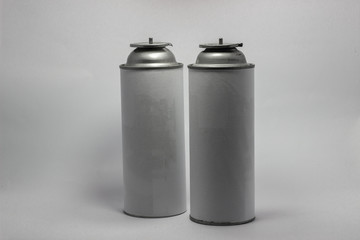 White portable tourist gas cylinder for burners with a white background.