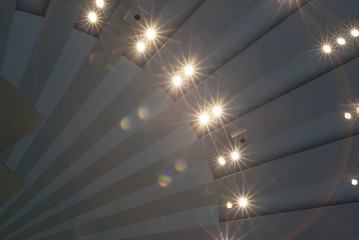 Ray like ceiling with light starburst
