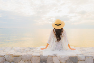 Portrait beautiful young asian women happy smile relax around sea beach ocean