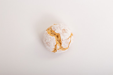 White macaroons on a white background