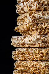 Instant noodles isolated on black background