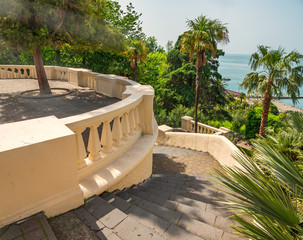 The old staircase in a park, descending to the sea