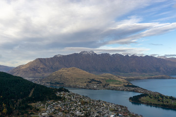 Fototapeta na wymiar Looking down at Queenstown with beautiful lake from top of Ben Lomond mountain