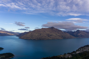 Fototapeta premium Looking down at Queenstown with beautiful lake from top of Ben Lomond mountain