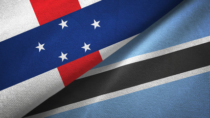 Netherlands Antilles and Botswana two flags textile cloth, fabric texture