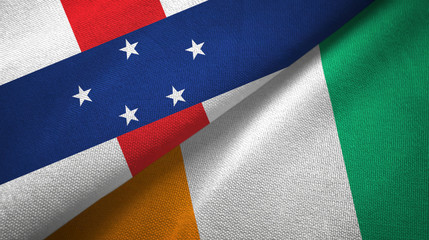 Fototapeta na wymiar Netherlands Antilles and Cote d'Ivoire Ivory coast two flags textile