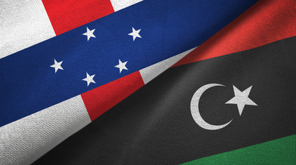 Netherlands Antilles and Libya two flags textile cloth, fabric texture