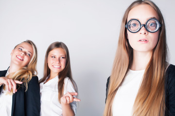 new student bookwarm in glasses against casual group on white background, teen drama, lifestyle people concept
