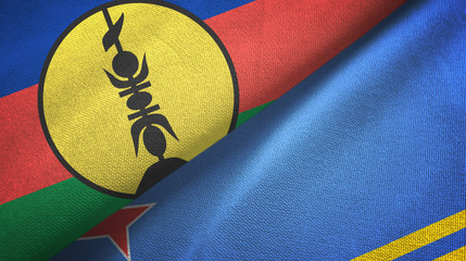New Caledonia and Aruba two flags textile cloth, fabric texture