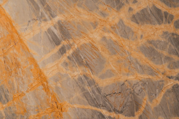 Natural marble with ripple mineral in yellow color / facade decoration / background texture / seamless pattern