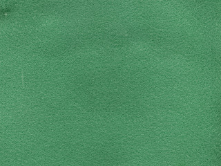 Texture of green felt fabric