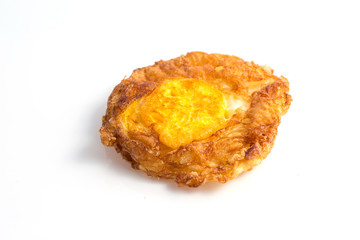 a fried egg on white background