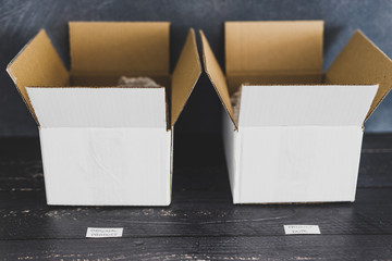 original product vs dupe imitation label inside delivery parcel boxes from online purchases