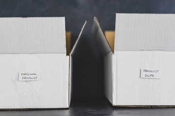 original product vs dupe imitation label inside delivery parcel boxes from online purchases