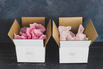 original product vs dupe imitation label inside delivery parcel boxes from online purchases