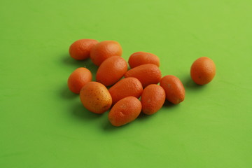 small and delicious orange fruits kumquat