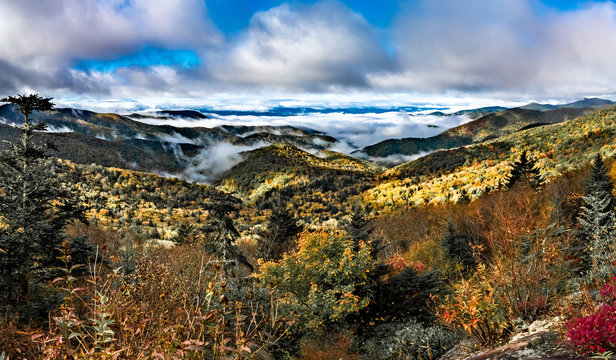 early morning autumn foggy photo at blue ridge parkway north carolina