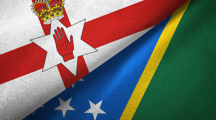 Northern Ireland and Solomon Islands two flags textile cloth, fabric texture