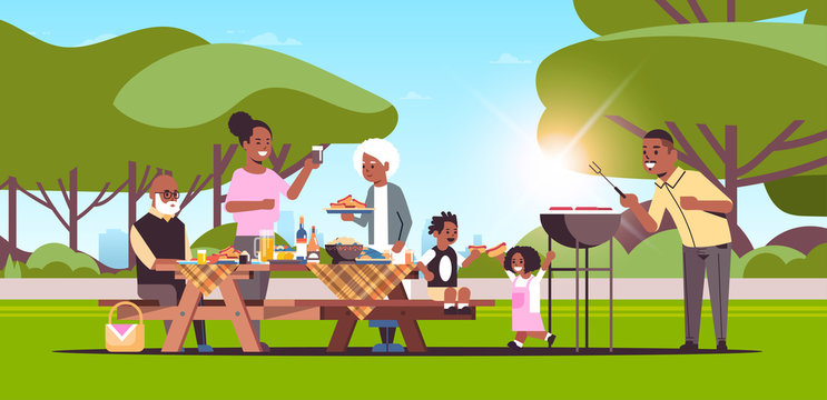 multi generation family preparing hot dogs on grill picnic barbecue party concept summer park landscape background flat full length horizontal vector illustration