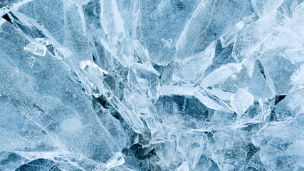 Broken ice on the lake. Pieces of ice close up. Pieces of ice in nature. Chunks of cracked ice...