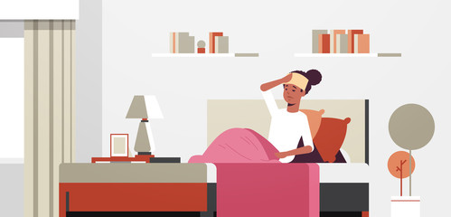 sick woman with wet towel on forehead unhealthy african american girl reducing high fever suffering from cold flu virus illness concept modern living room interior full length horizontal vector
