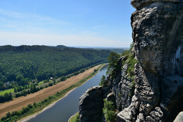 Fototapeta na wymiar Bastai rock formation (Saxon Switzerland) in summer. Germany, Europe