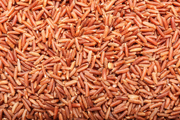 Heap of raw rice as background