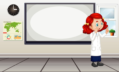 Classroom scene with science teacher by the board