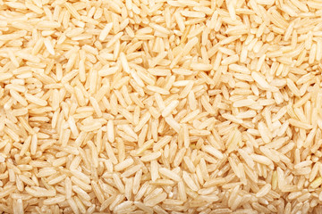 Heap of raw rice as background