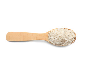 Spoon with raw rice on white background