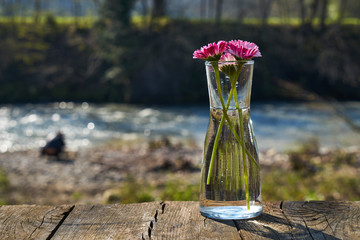 Obraz na płótnie Canvas Image of a glass flask with flowers.