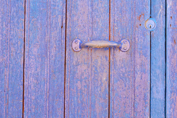 Door with a lock. Urban photo.