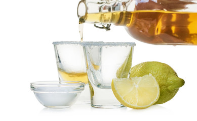 strong drink is poured into a glass