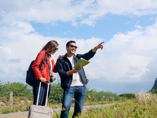 Asian tourists couple have fun with nature background, lifestyle concept.