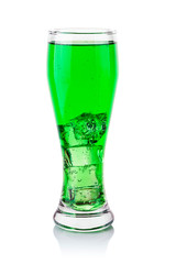 glass with green carbonated drink and ice