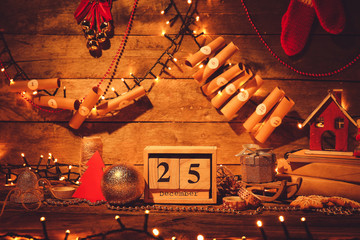 Christmas decor and calendar on wooden background