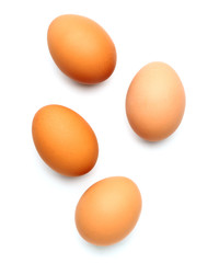 Fresh eggs on white background