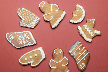 Christmas background. Handmade festive gingerbread cookies. Copy space for text. Winter holidays background mock up