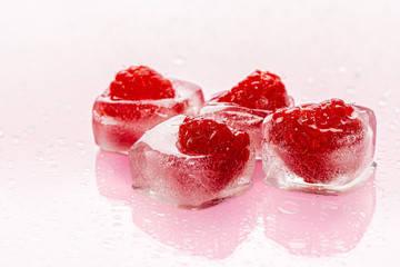 Obraz na płótnie Canvas Close up of ice cubes with berries