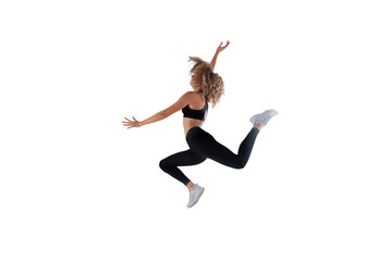 Fototapeta na wymiar Female athlete running and jumping isolated on white.