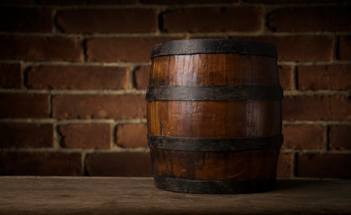 Fototapeta premium background of barrel and worn old table of wood