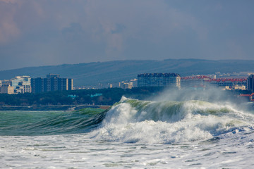 Black Sea. Beautiful, big storm waves at the entrance to Gelendzhik Bay. In the background of the...